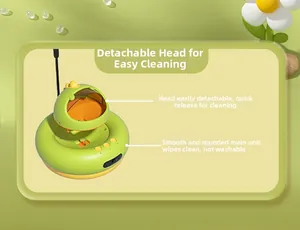 Detail view of the detachable green pet feeder top showing easy cleaning feature