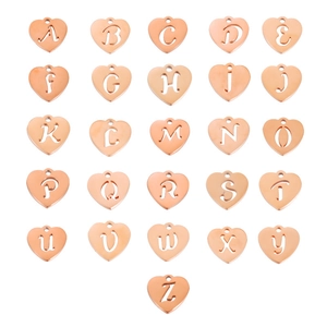 Rose gold heart pendants with hollowed A-Z letters on white background 26pcs set