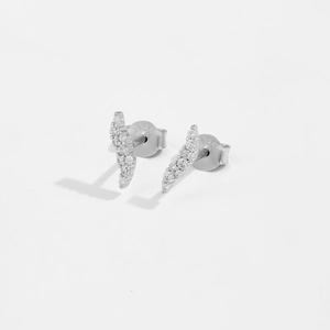 Detail view of S925 sterling silver studs with lightning shape and clear cubic zirconia