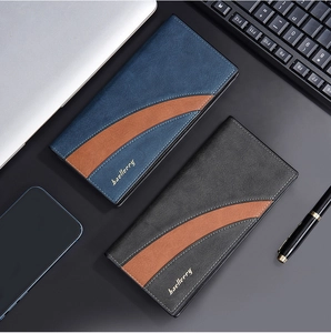 Detailed view of black and blue business long wallets on a professional office desk