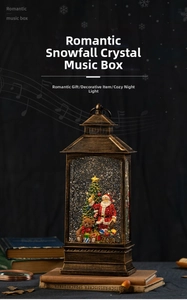 Detail of vintage bronze Christmas snow globe music box with Santa and teddy bear inside