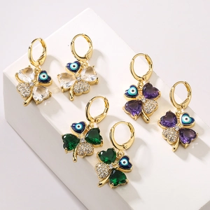 Three pairs of gold-plated clover evil eye earrings with clear green and purple zircons