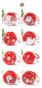 Detailed view of variety of Christmas themed tinplate coin purses with lanyards