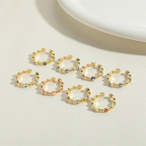 Detailed set of 8 gold-plated evil eye open rings with colorful enamel and zircon stones
