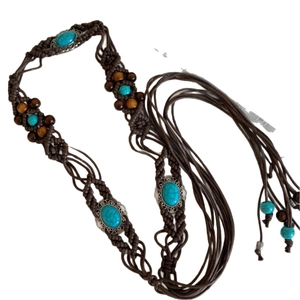 Bohemian wax rope waist chain with turquoise stones and wooden beads on white background