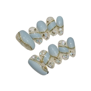 Handmade light blue press-on nails with gold edges and shell fragments, set of 10