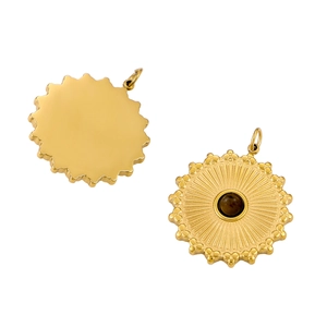 Detailed view of a gold sun pendant featuring a brown natural stone and radial texture