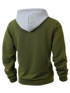 Detail view of olive green waffle knit texture and grey hood on men hoodie back