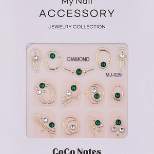K9 crystal nail art stickers set with gold metal frames and green rhinestones
