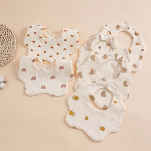 Detailed set of six cotton baby bibs with cute cartoon patterns and snap closure