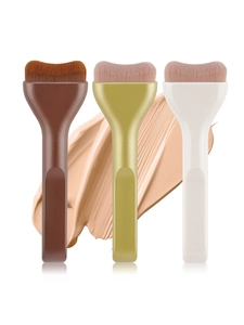 Flat tongue-shaped foundation brushes with thin dense bristles in three colors