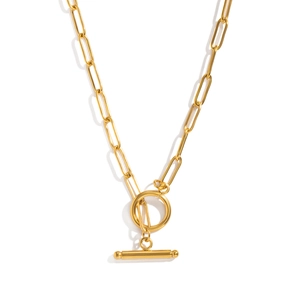 Detail of gold paperclip chain necklace featuring a modern toggle clasp closure