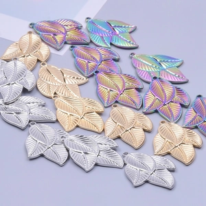 Leaf pendant necklace charms in gold, silver, and rainbow stainless steel finishes