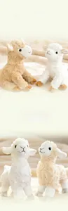 Close-up of white and brown plush lamb toys with soft curly faux fur texture and cute look