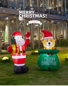 Luminous inflatable Santa and bear in green bag for outdoor Christmas yard decoration