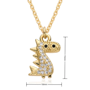 Detailed view of tiny dinosaur pendant showing 15mm height and 10mm width dimensions