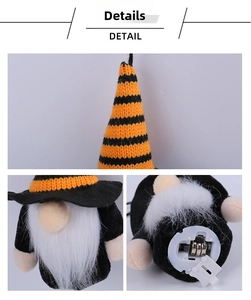 Detail view of Halloween gnome plush with striped hat and battery compartment base