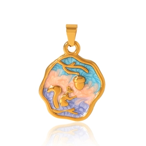 Macro detail of a gold squirrel and acorn enamel pendant with colorful nebula patterns