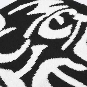 Knit beanie with black and white jacquard letter patterns and warm double-layer fabric