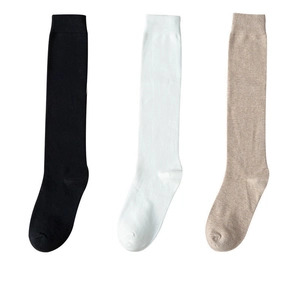 Three pairs of JK uniform cotton knee-high socks in black, white, and beige on white background