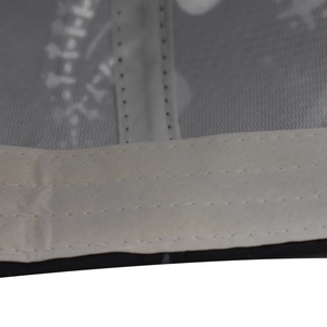 Close-up of baseball cap interior showing white mesh lining and precision stitching detail