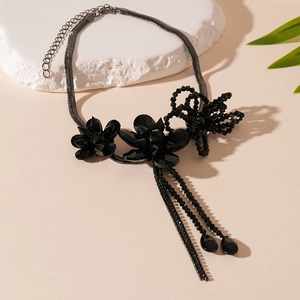 Dark gothic floral statement necklace with black bead tassels and gunmetal chain