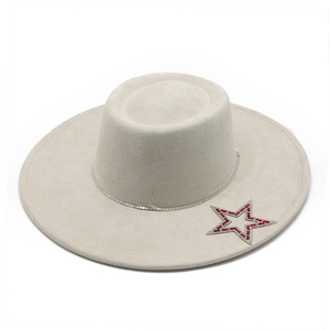 Beige wide brim felt fedora hat featuring silver rhinestone chain and star emblem patch