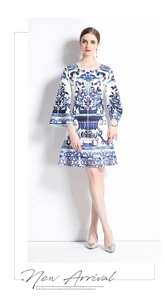 Close-up of blue and white porcelain floral print on round neck bell sleeve dress