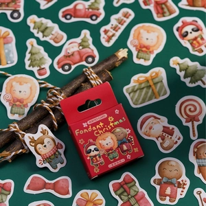 Christmas themed stickers box featuring Santa and reindeer for DIY journaling and scrapbooking