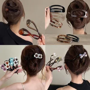 Set of minimalist large twisted hair clips featuring floral and bow designs for hair styling