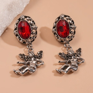 Vintage Baroque drop earrings featuring red oval stones and silver angel pendants