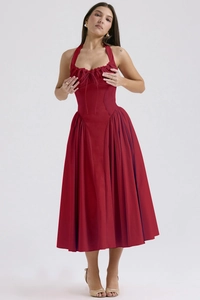 Detail of the halter neckline and drawstring pleated bodice on a vintage red dress