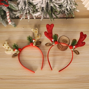 Christmas reindeer antler headbands in red and gold with festive pine and bell decorations