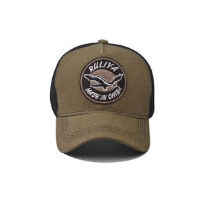 Distressed cotton baseball cap with eagle patch embroidery and breathable mesh back