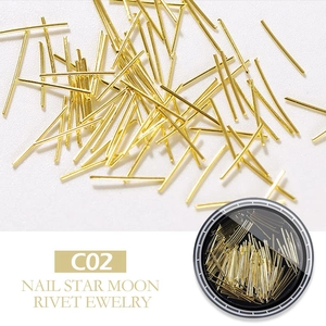 Macro view of C02 gold slender metal rivets for star and moon nail art decoration