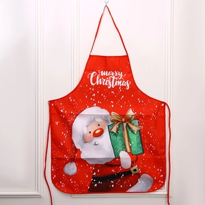 Red Christmas apron featuring Santa Claus and Merry Christmas text for holiday parties
