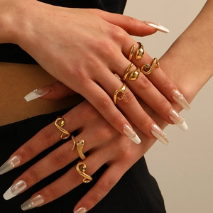 Golden snake-shaped stainless steel rings set for women featuring colorful rhinestones
