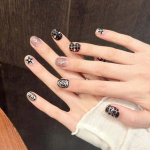 Handmade Y2K gothic press-on nails with silver stars and metallic cross 3D charms