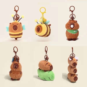 Collection of six cute Capybara plush keychains in various outfits and creative poses
