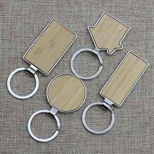 Bamboo wood and metal keychain set in various geometric shapes with round key rings