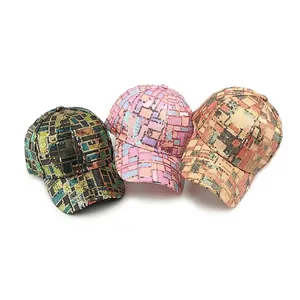 Three sequined baseball caps in colorful patchwork patterns for sun protection