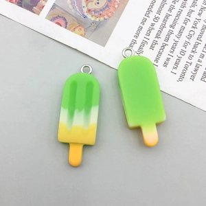 Detail of colorful resin ice cream popsicle charms with metal loops for DIY jewelry