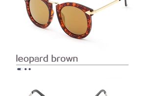 Detail of leopard brown round sunglasses with premium gold metal bridge and temples