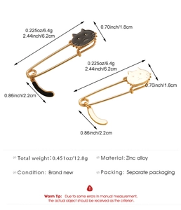 Detailed size specifications of white and black cat enamel safety pins in zinc alloy