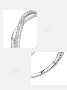 Macro detail showing S925 hallmark and 5A cubic zirconia on silver crossover ring