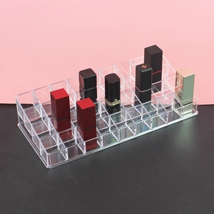 Clear acrylic lipstick organizer with multi-grid design for cosmetic desktop storage