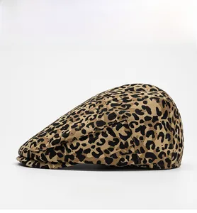 Detail view showing the leopard print pattern and side profile of the cotton flat cap
