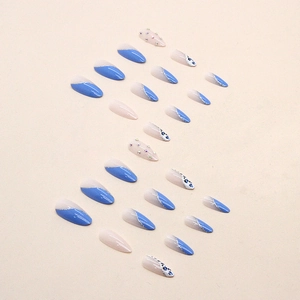 Almond blue leopard press-on nails set with glitter and rhinestone accents