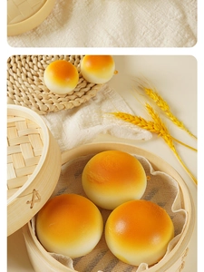Detailed view of slow rebound PU foam bread toy in a bamboo steamer with wheat decor