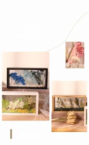 Detail of wooden dried flower frames in black, white, and natural wood finishes